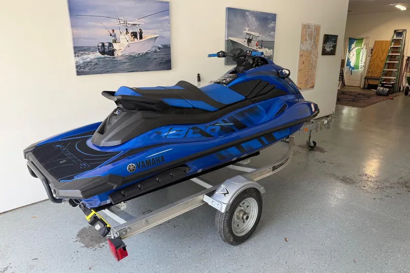 Slide: The Image of 2023 Yamaha WaveRunner GP1800R SVHO in a garage on a trailer. - 3