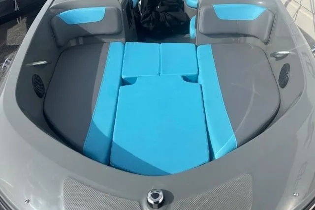 Slide: The Image of 2021 Bayliner Element E16 boat interior with blue and gray seating. - 11