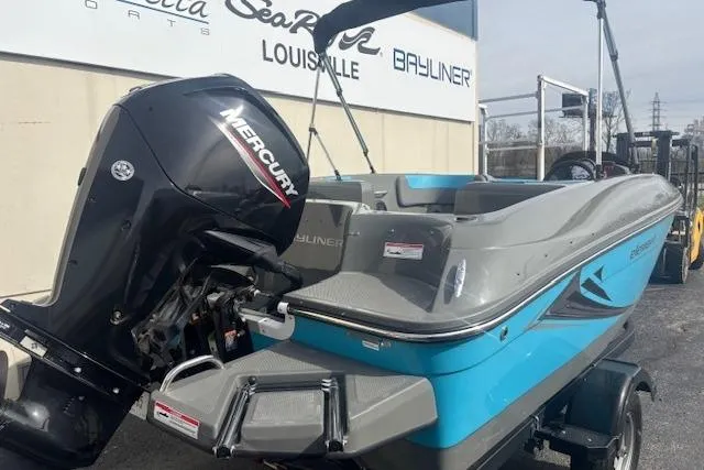 Slide: The Image of 2021 Bayliner Element E16 boat with Mercury engine, parked outside dealership. - 3