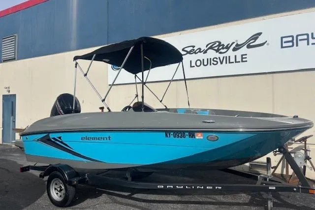 Slide: The Image of 2021 Bayliner Element E16 boat on trailer at Sea Ray dealership. - 4
