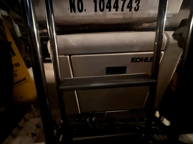 Slide: The Image of Kohler generator in the engine room of 1996 Sea Ray 500 Sundancer. - 36