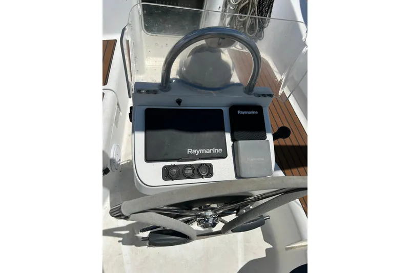 Slide: The Image of Steering console of 2004 Beneteau Oceanis Clipper 331 with Raymarine navigation equipment. - 30