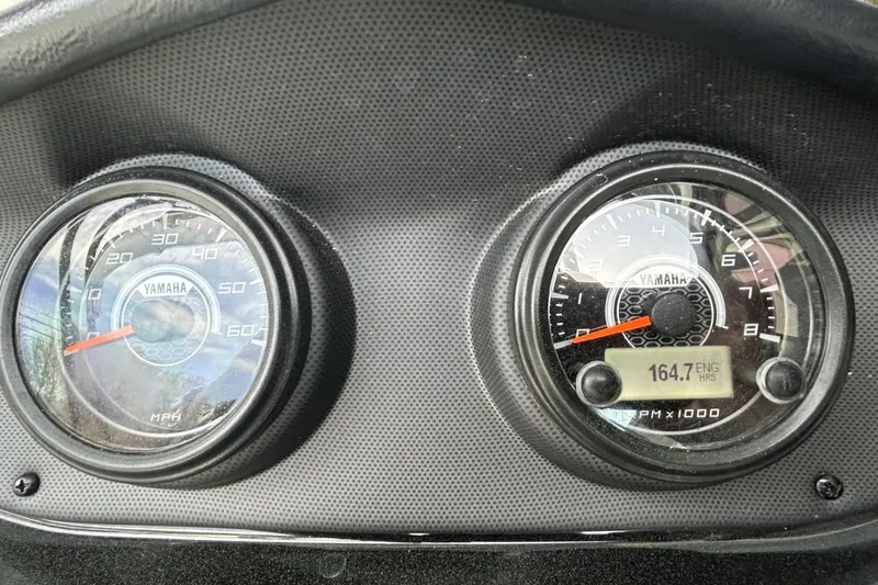 Slide: The Image of Dashboard gauges of a 2016 Yamaha Boats AR192, showing speed and engine hours. - 5