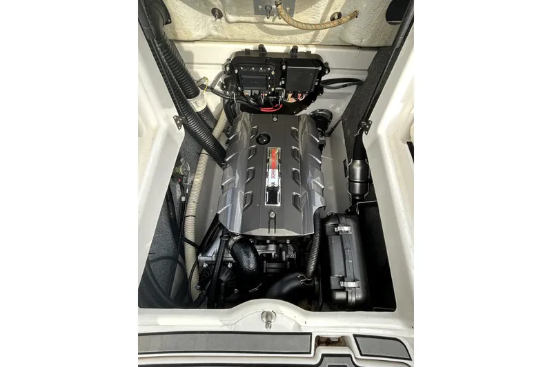 Slide: The Image of Engine compartment of a 2016 Yamaha Boats AR192, showcasing mechanical components. - 7