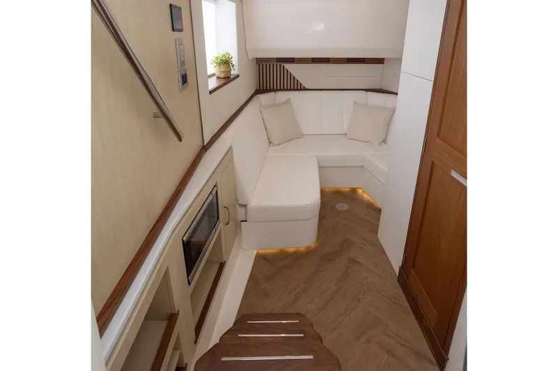 Slide: The Image of Manufacturer Provided Image: Luxurious interior of 2026 Regal 43 SAV yacht with elegant seating and modern design. - 13