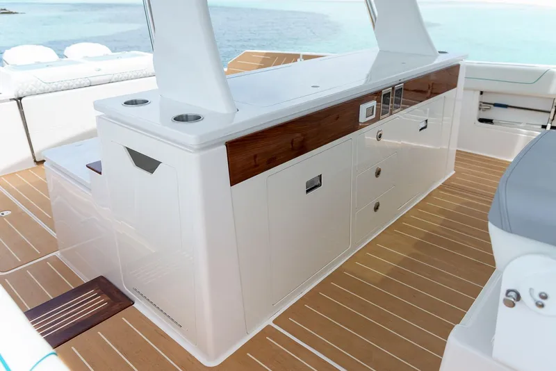 Slide: The Image of Manufacturer Provided Image: 2026 Regal 43 SAV yacht interior with sleek cabinetry and ocean view. - 9