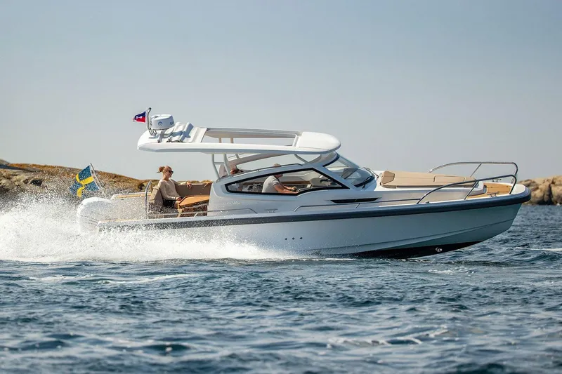 Slide: The Image of Manufacturer Provided Image: Nimbus Weekender 9 boat 2025 cruising on water. - 1
