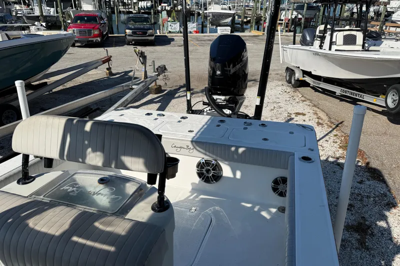Slide: The Image of 2022 Canyon Bay 28h boat with Mercury engine at marina dock. - 7