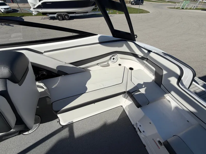 Slide: The Image of Interior of a 2020 Yamaha AR240 boat with seating area. - 12