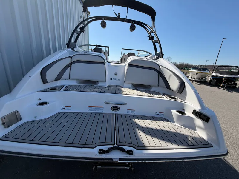 Slide: The Image of Yamaha AR240 2020 boat rear with seating area and speakers. - 14
