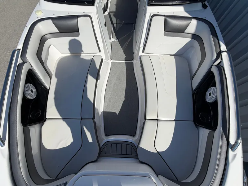 Slide: The Image of Interior of a 2020 Yamaha AR240 boat with white seating. - 4