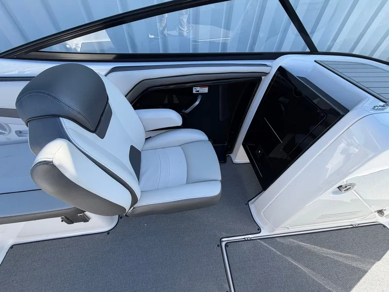 Slide: The Image of Interior of a 2020 Yamaha AR240 boat with seating and storage. - 9