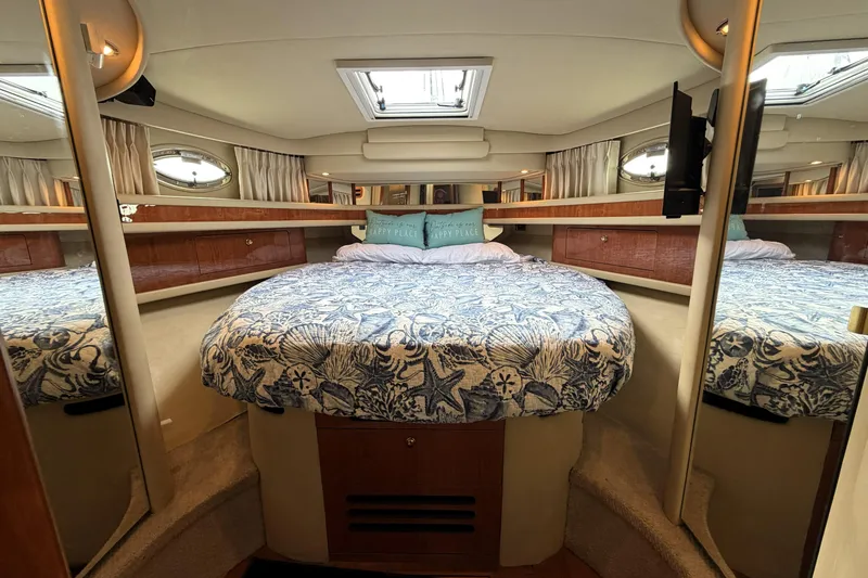 Slide: The Image of Luxurious cabin interior of 2000 Sea Ray 450 Express Bridge yacht. - 18
