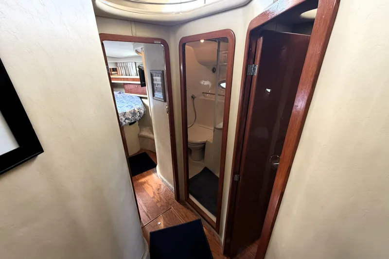 Slide: The Image of Interior view of 2000 Sea Ray 450 Express Bridge yacht cabin and bathroom. - 35