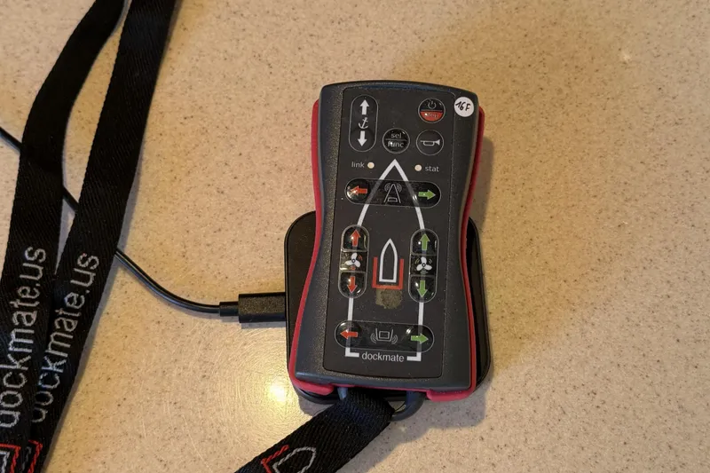 Slide: The Image of Remote control for Sea Ray 450 Express Bridge 2000, featuring docking controls and lanyard. - 41