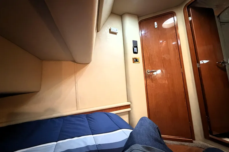 Slide: The Image of Interior cabin view of a 2000 Sea Ray 450 Express Bridge yacht. - 50