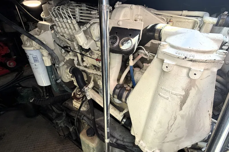 Slide: The Image of Engine compartment of a 2000 Sea Ray 450 Express Bridge boat. - 64