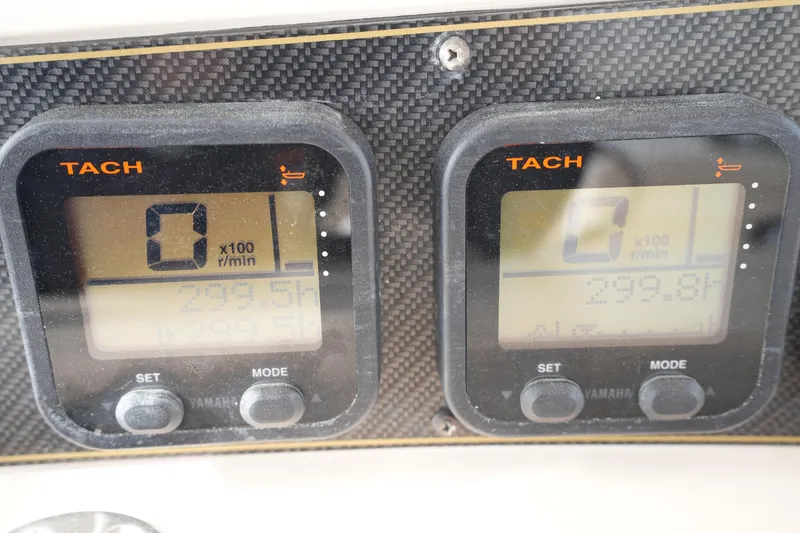 Slide: The Image of Tachometer display on 2009 Grady-White Express 330 boat dashboard. - 37