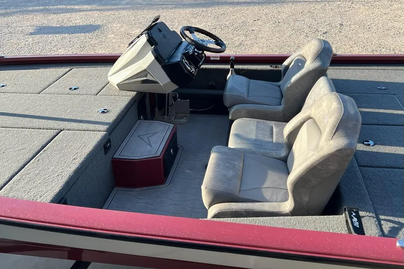 Slide: The Image of 2024 Avid 20 XB boat interior with dual seats and steering console. - 15
