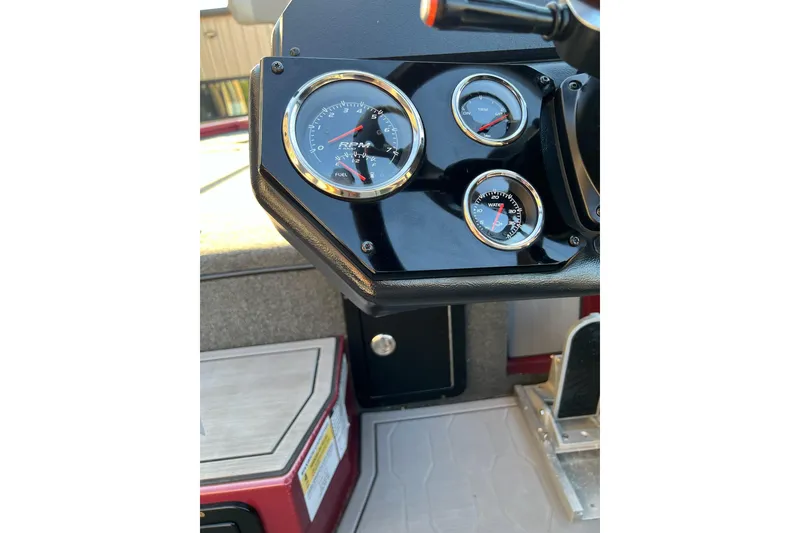 Slide: The Image of Dashboard of 2024 Avid 20 XB boat with gauges and controls. - 17