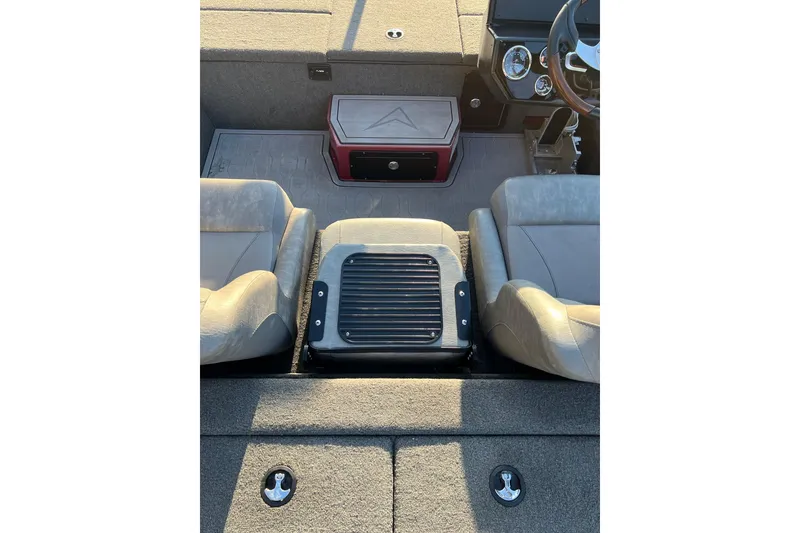 Slide: The Image of Interior of 2024 Avid 20 XB boat with seating and storage compartments. - 19