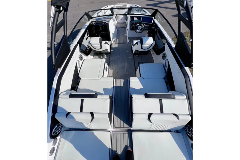Slide: The Image of 2024 Yamaha Boats 222SD interior with sleek seating and modern dashboard design. - 13