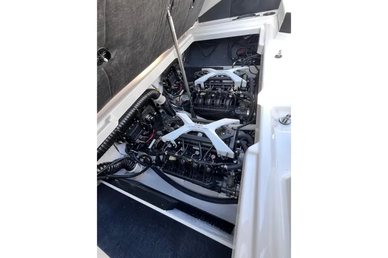 Slide: The Image of 2024 Yamaha Boats 222SD engine compartment showcasing dual engines and mechanical components. - 20