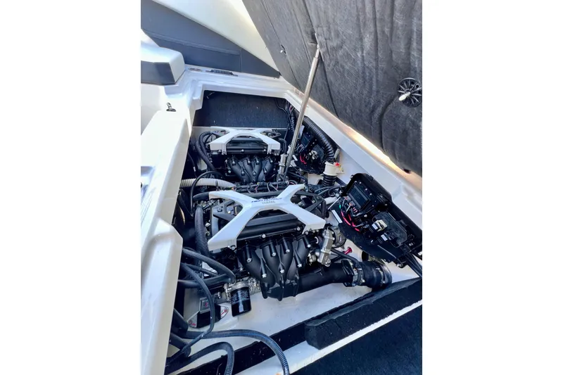 Slide: The Image of 2024 Yamaha Boats 222SD engine compartment showcasing dual engines and components. - 21