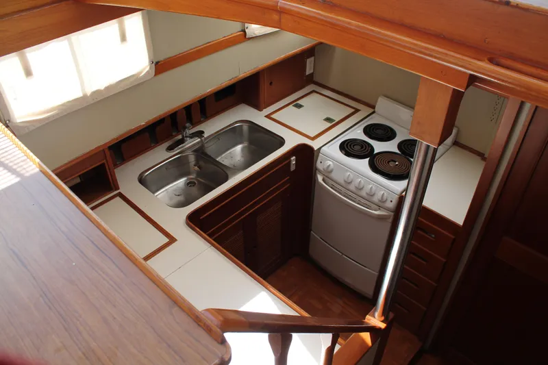 Slide: The Image of Galley kitchen in 1987 Grand Banks 42 Motoryacht with stove and double sink. - 19