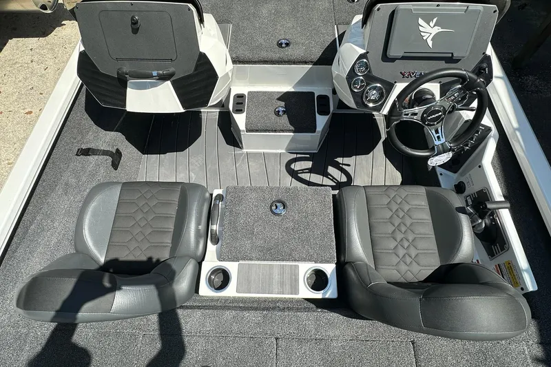 Slide: The Image of 2026 Vexus AVX1880 boat interior with dual seats, steering wheel, and dashboard controls. - 13