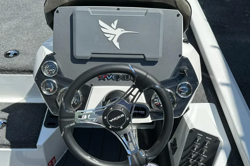 Slide: The Image of Steering console of 2026 Vexus AVX1880 boat with gauges and controls. - 14