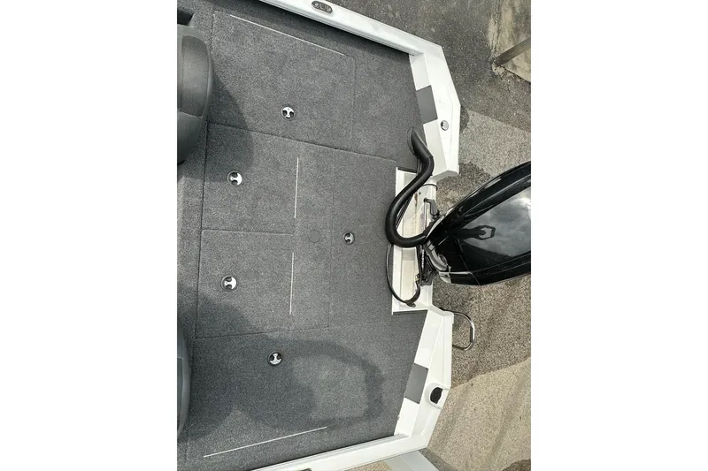 Slide: The Image of 2026 Vexus AVX1880 boat deck with carpeted flooring and storage compartments. - 26