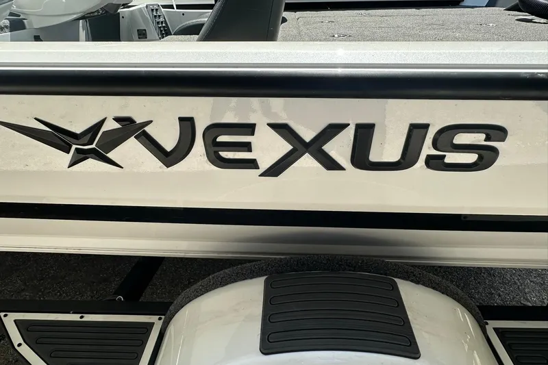 Slide: The Image of 2026 Vexus AVX1880 boat logo on sleek white exterior. - 30