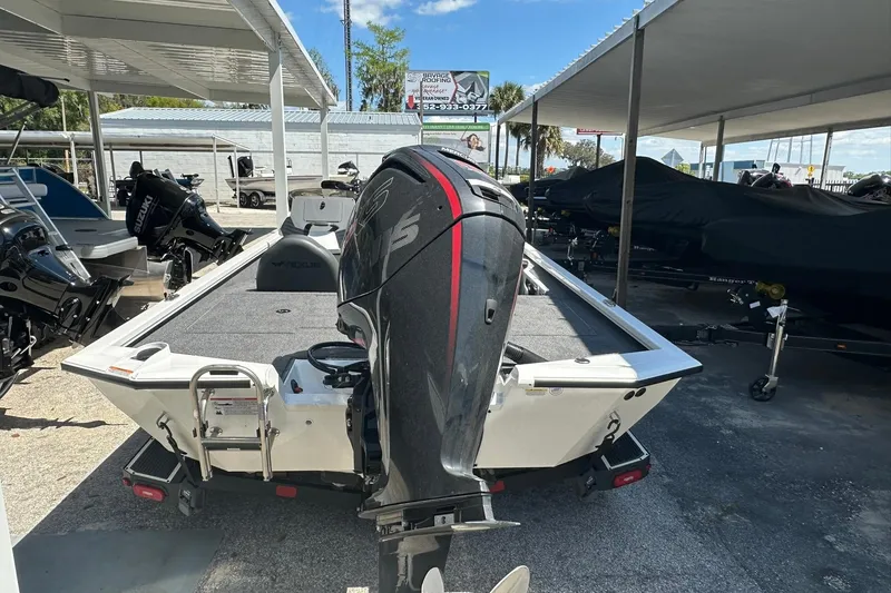 Slide: The Image of 2026 Vexus AVX1880 boat with powerful outboard motor in a dealership lot. - 35