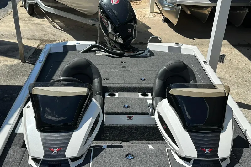 Slide: The Image of 2026 Vexus AVX1880 boat interior with dual seats and modern dashboard design. - 4