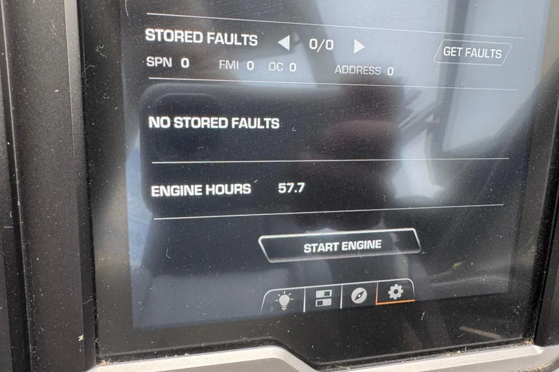 Slide: The Image of Display screen of 2024 Supra SA 450 showing no stored faults and 57.7 engine hours. - 10