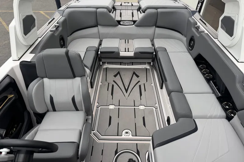 Slide: The Image of 2024 Supra SA 450 boat interior with sleek gray seating and modern design. - 6