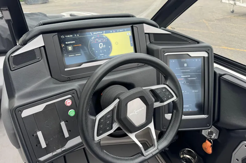 Slide: The Image of 2024 Supra SA 450 dashboard with digital displays and steering wheel. - 7