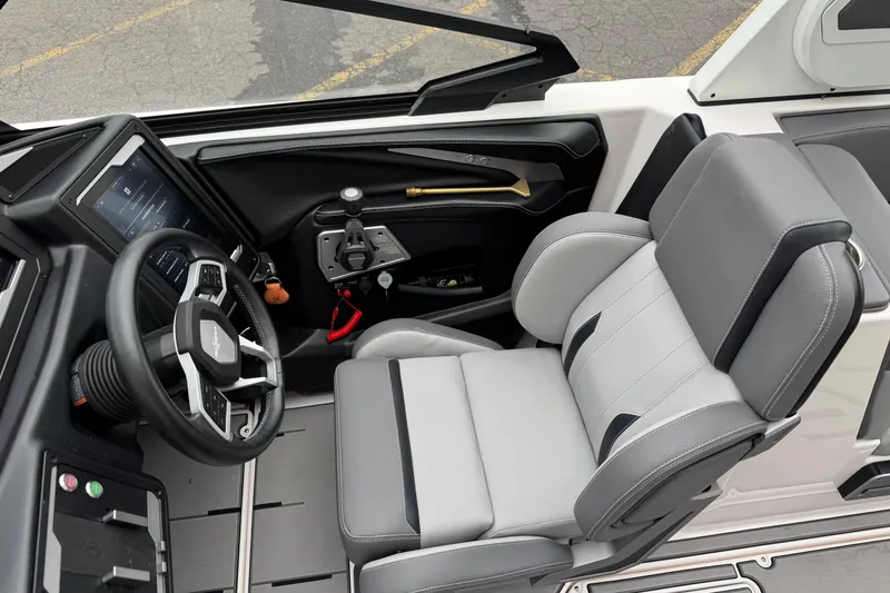 Slide: The Image of 2024 Supra SA 450 boat cockpit with modern steering and controls. - 8