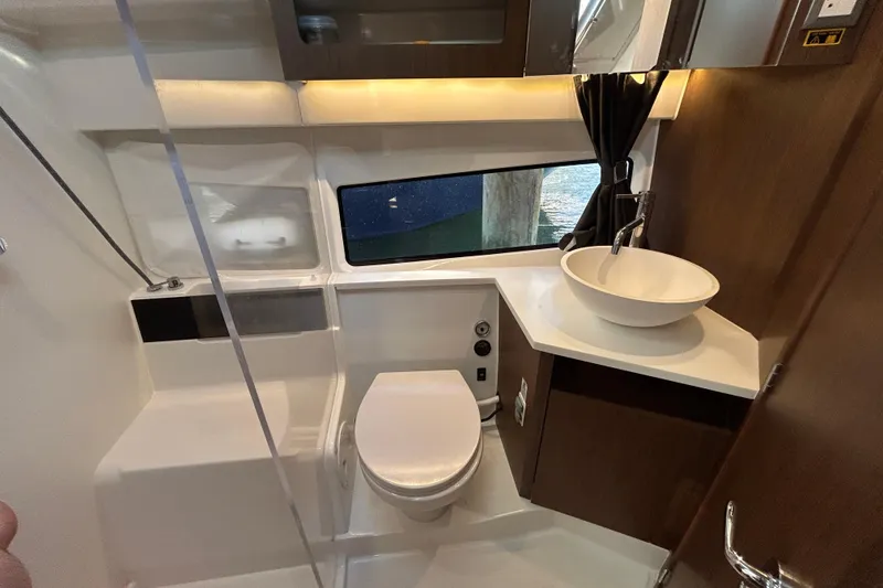 Slide: The Image of Modern bathroom interior of 2025 Beneteau Antares 11 Fly yacht, featuring sleek design and amenities. - 10