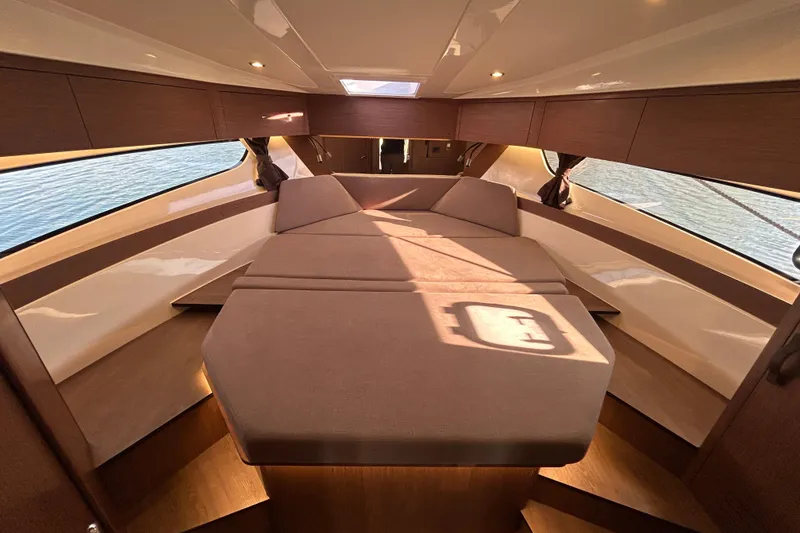 Slide: The Image of Luxurious interior cabin of 2025 Beneteau Antares 11 Fly yacht with elegant wood finish. - 9