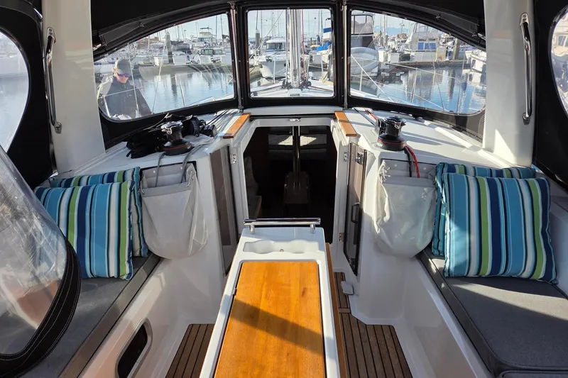 Slide: The Image of Spacious cockpit with custom cushions/pillows and arch-supported dodger - 18