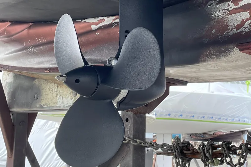 Slide: The Image of Propeller of 2022 Beneteau Oceanis 38.1 sailboat in dry dock - 24