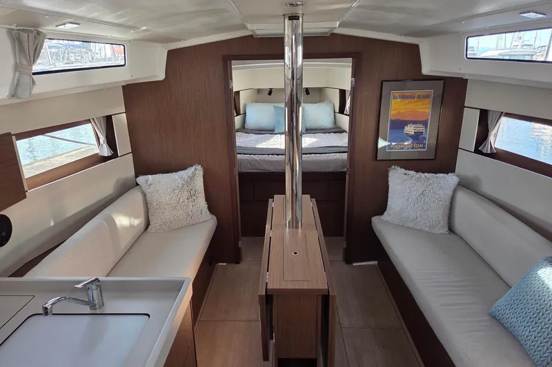 Slide: The Image of 2022 Beneteau Oceanis 38.1 salon looking forward into vee berth - 36