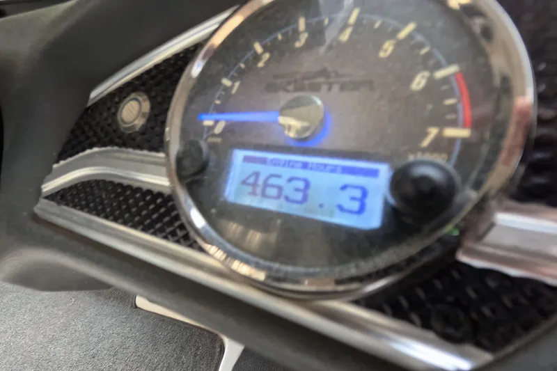 Slide: The Image of Close-up of 2015 Skeeter FX21 boat dashboard displaying 463.3 hours. - 11