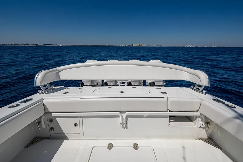 Slide: The Image of 2017 Bahama 41 boat deck with ocean view under clear blue sky. - 20