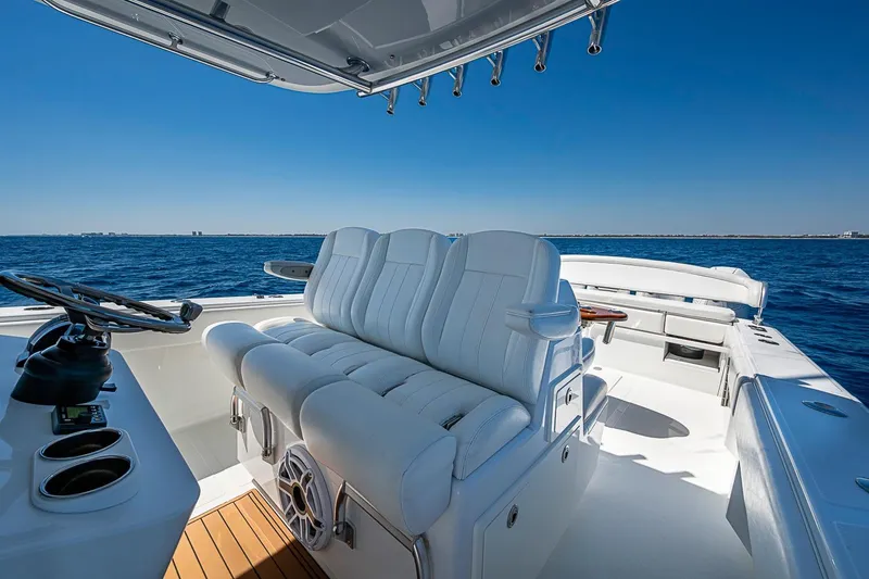 Slide: The Image of Luxurious 2017 Bahama 41 boat interior with plush seating on open water. - 24
