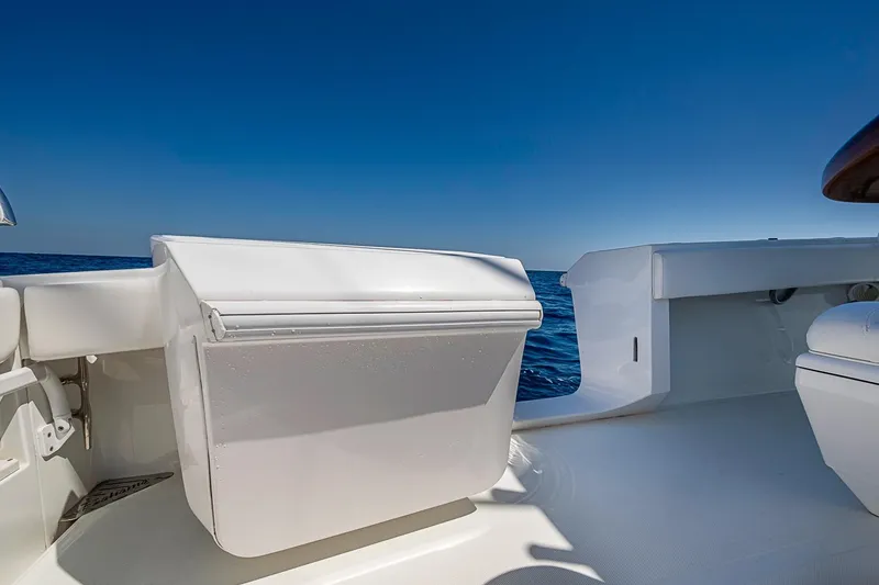 Slide: The Image of 2017 Bahama 41 boat deck with ocean view under clear blue sky. - 33