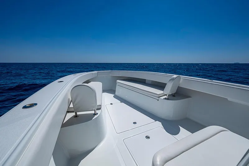 Slide: The Image of 2017 Bahama 41 boat deck with ocean view under clear blue sky. - 37