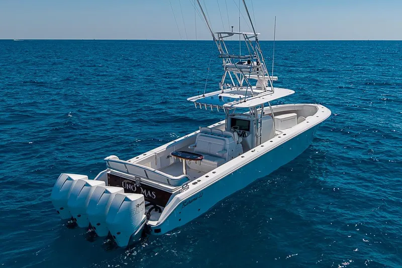 Slide: The Image of 2017 Bahama 41 boat cruising on open blue ocean waters. - 5